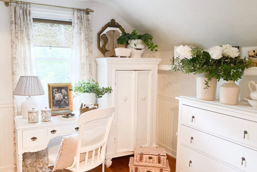 Cozy room ideas for a cottage guest bedroom decorated in whites with antique furniture