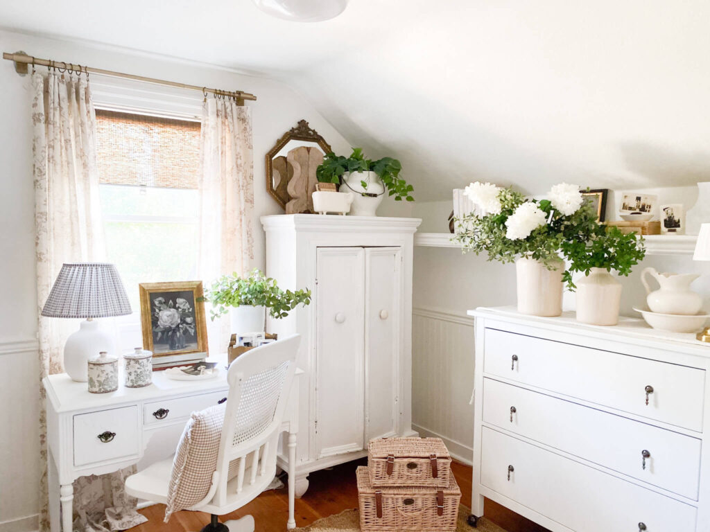 Cozy room design with vintage white furniture, floral brown curtains and vintage decor