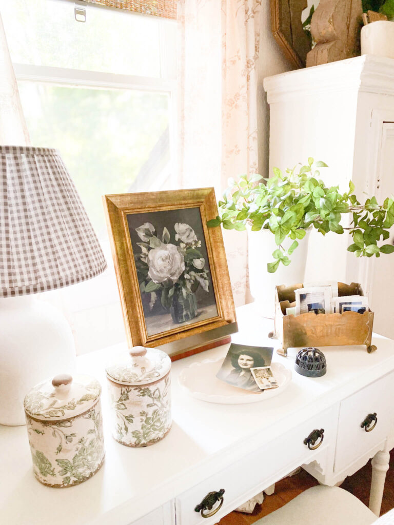 Vintage desk with floral print and vintage photos