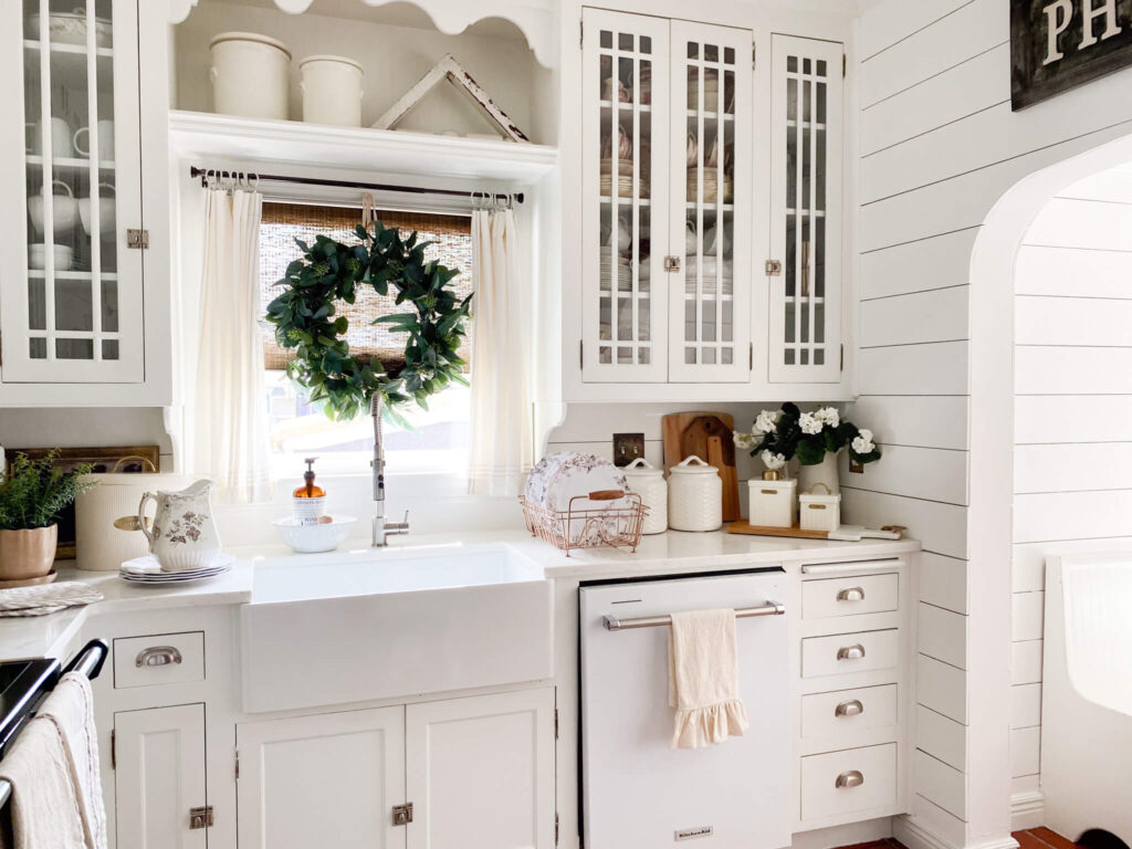 White cottage kitchen with brown transferware melamine dishes