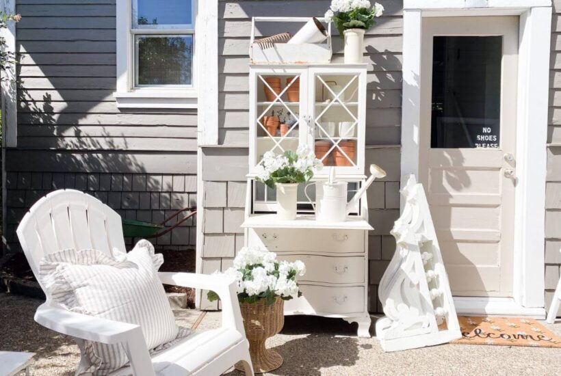 DIY potting bench with DIY florals and vintage corbels.