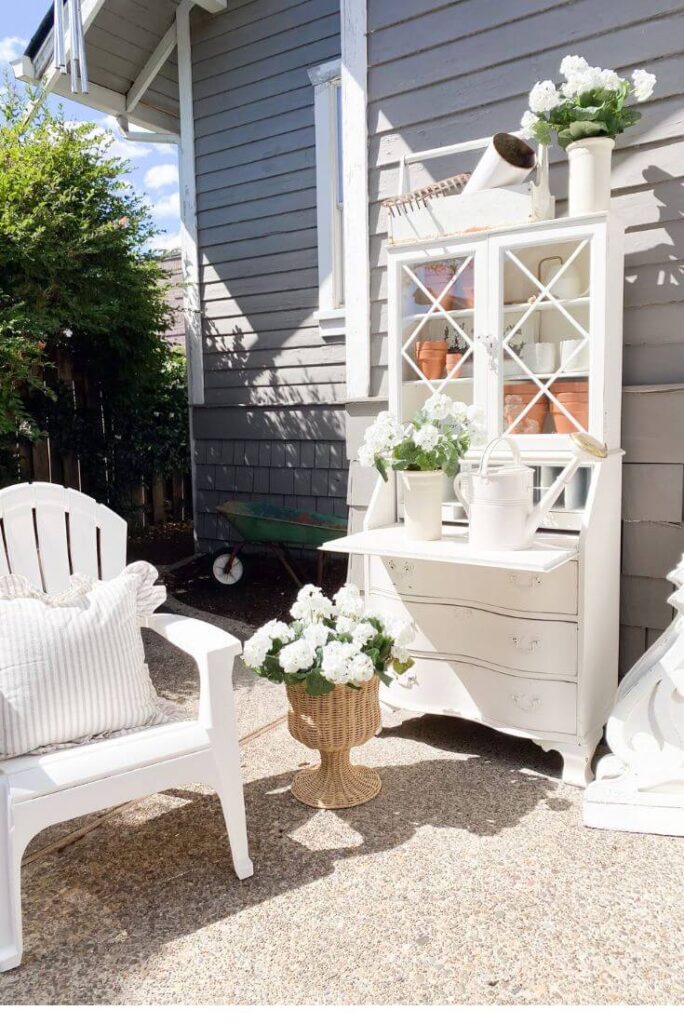 Cozy outdoor patio space with DIY potting bench