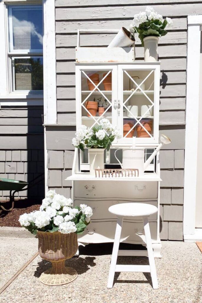 Cottage desk repurposed into a faux potting bench