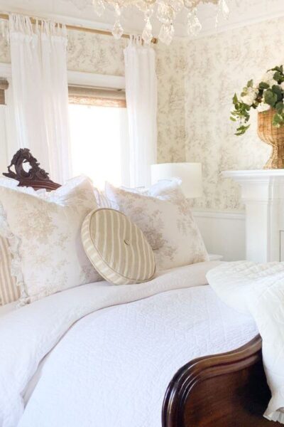 Simple bedroom makeover with cozy cottage style, wicker planter, and floral accents.