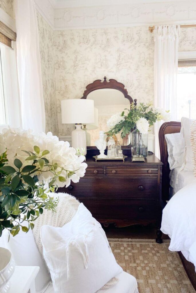 Simple cozy cottage bedroom makeover with white faux floral from Amazon