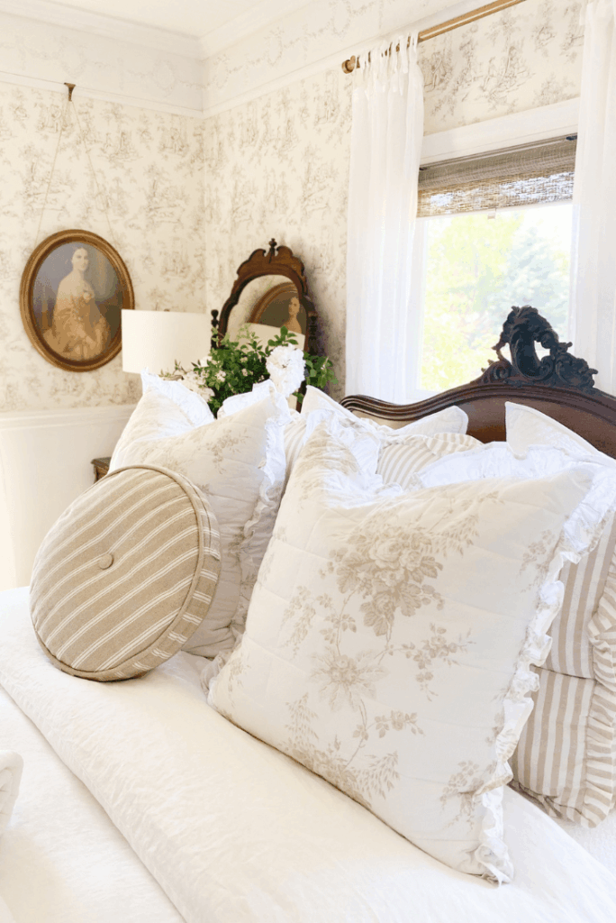 Ruffled cabbage rose pillows for styling a cottage bedroom refresh