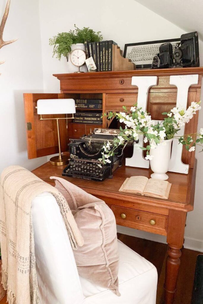 Cozy small bedroom styled with antique finds and collected decor