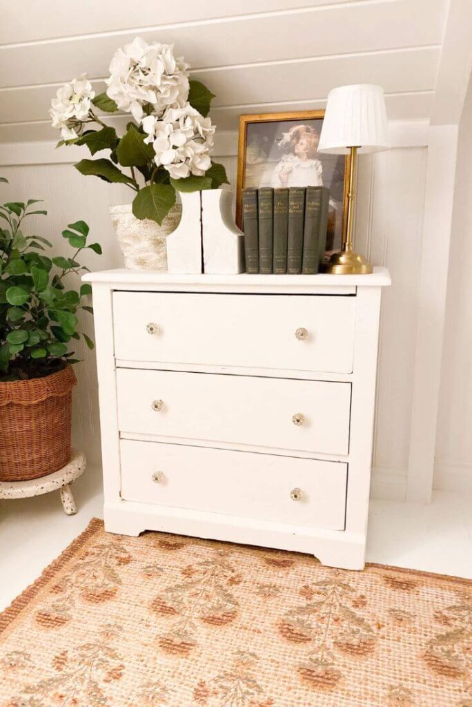 Patterned botanical jute rug styled in an attic sitting area.
