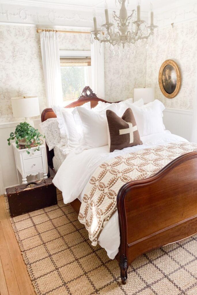 Darker jute rug paired with antique wood furniture.