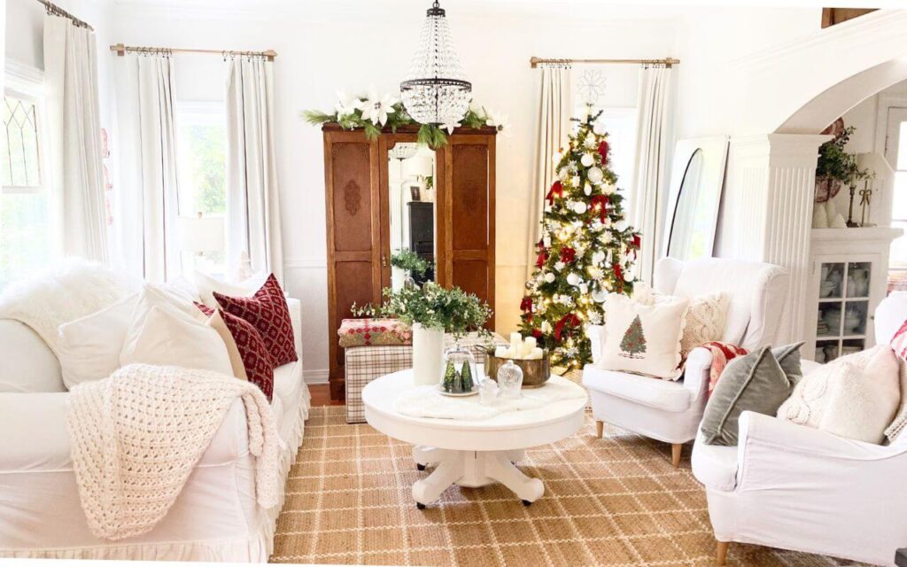 Vintage-inspired Christmas decor with red accents, antique pieces, and soft whites