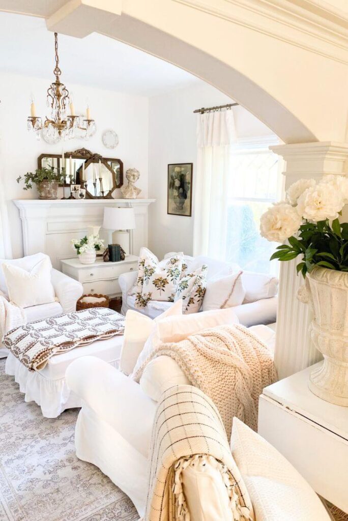 Cozy living room refresh with floral pillows, ruffled coverlet, and layered winter textiles