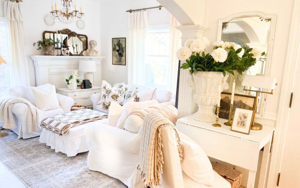 White living room decor styled before spring for a cozy winter look.
