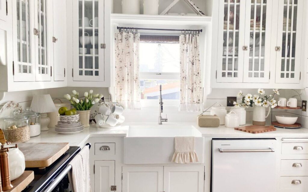 Ruffled kitchen sink curtains in a cottage kitchen