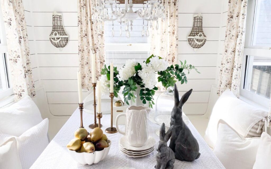 Floral kitchen curtains in a cozy cottage breakfast nook