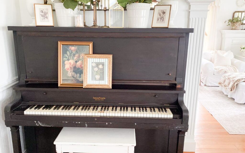 Before picture of an upright piano before a paint makeover.