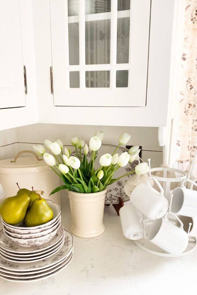Amazon faux tulips in the kitchen for a cozy cottage spring look.