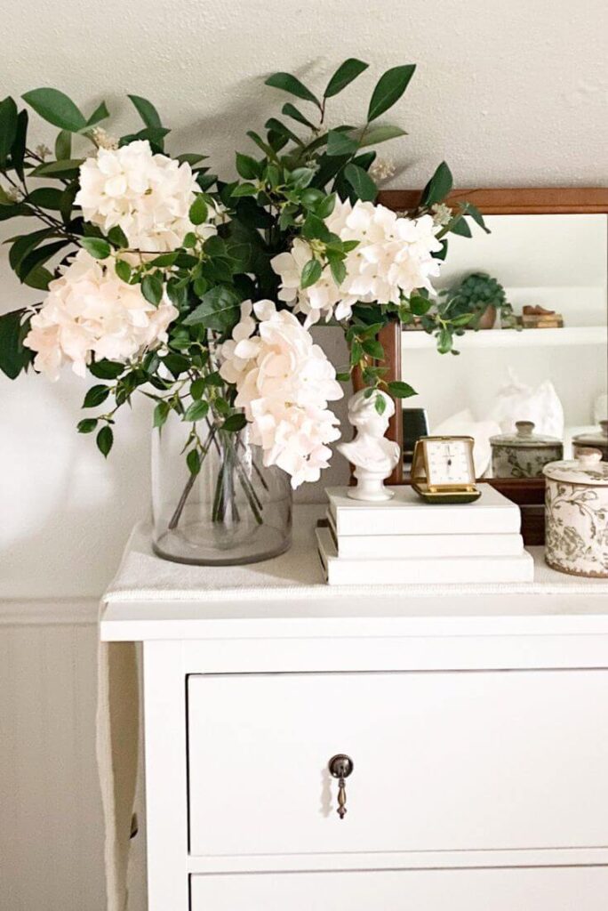 Where to buy faux flowers like pink hydrangeas for a fresh spring look.