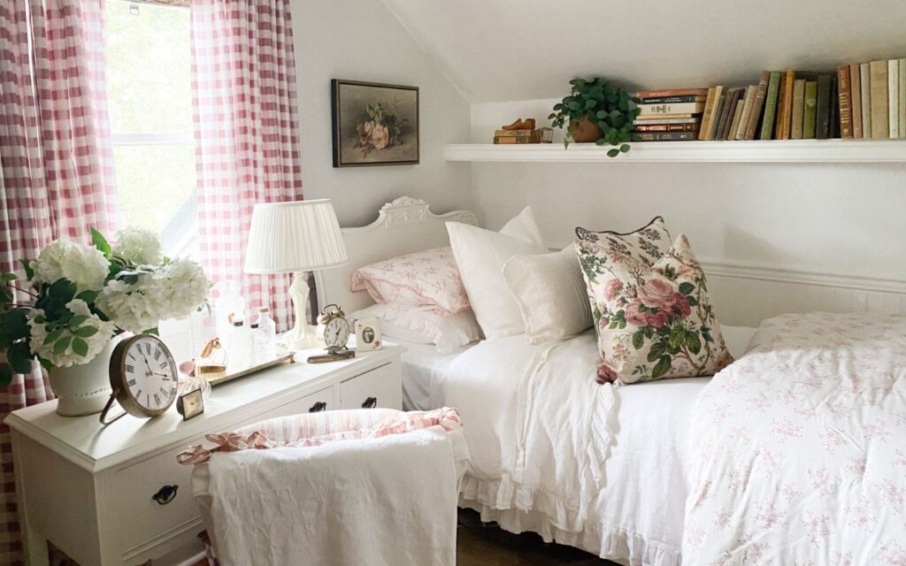 Pink accent color in cottage guest bedroom refresh, cabbage rose pillow and gingham curtains