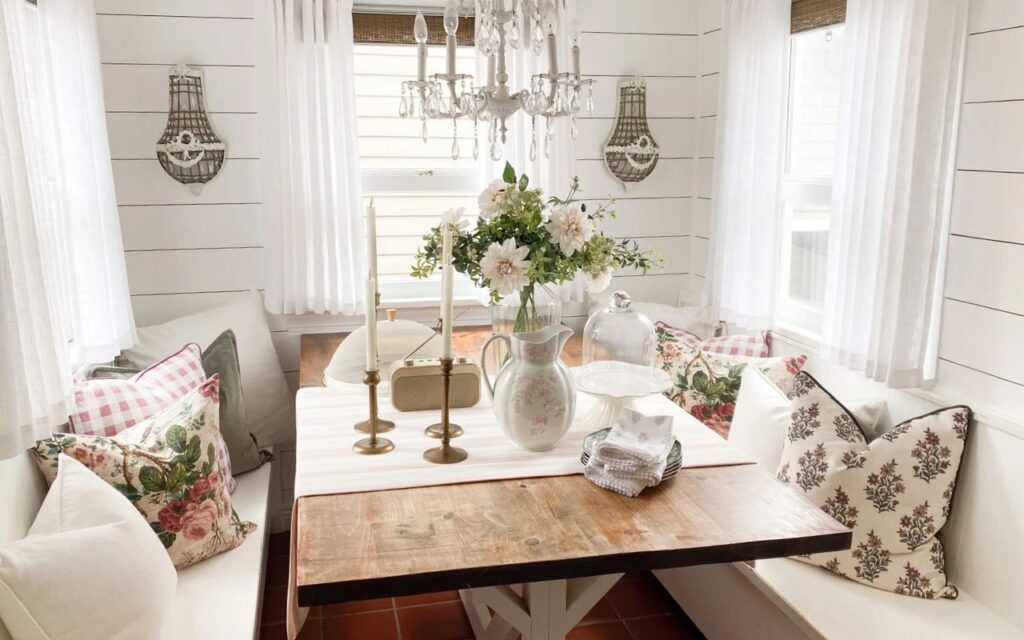 Cottage kitchen nook refresh with pink gingham and cabbage rose floral pillows