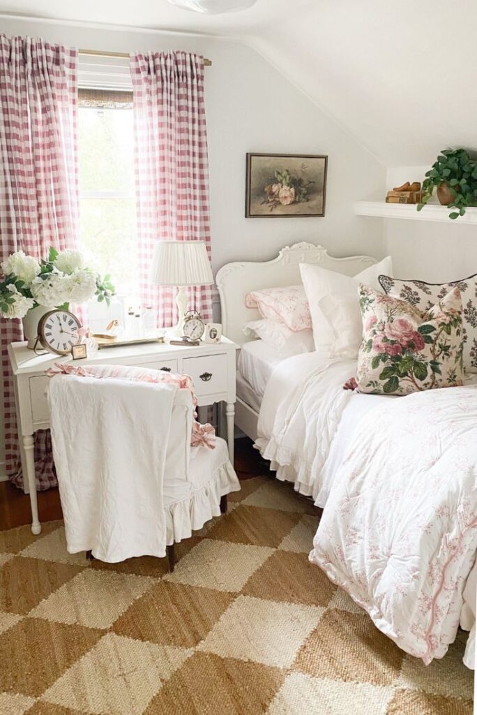 Guest bedroom pattern refresh with diamond jute rug, gingham check curtains and cabbage rose floral pillows